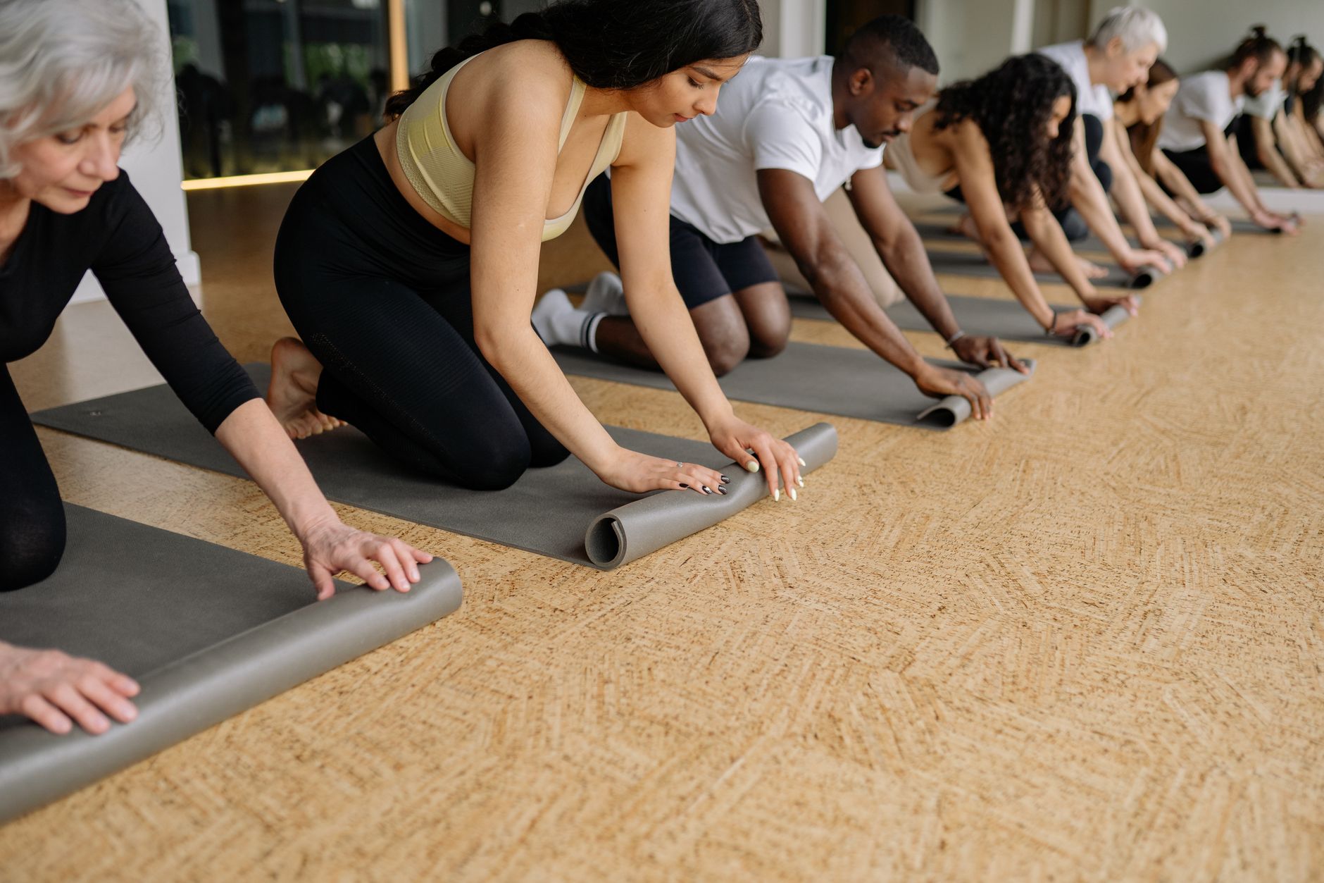 Cours collectif en petit groupe sur les tapis